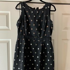 Black polka dot mini dress